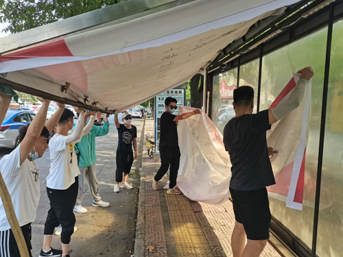 ⑧更换站亭公益广告.jpg
